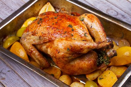 Chicken with Lemon, Lime, Potato and Thymeの写真素材