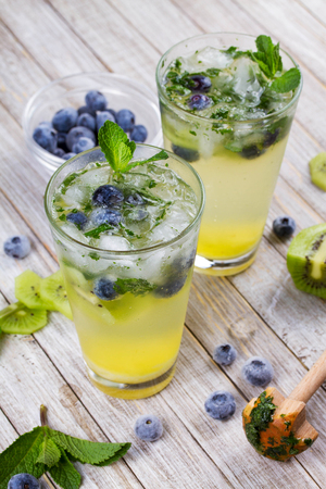 Kiwi and blueberry mojitoの写真素材