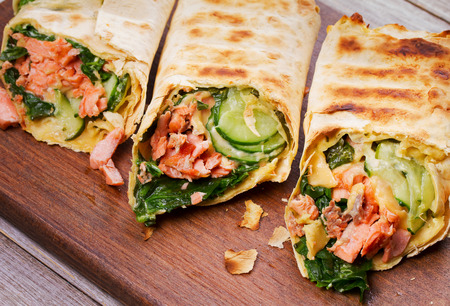 Salmon, Spinach, Cheese and Cucumber Burritosの写真素材