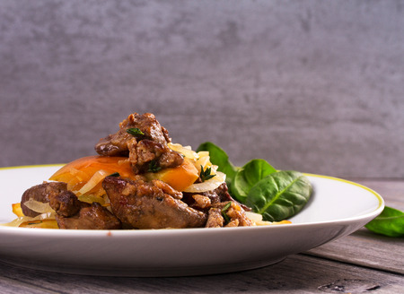 Liver with apple, spinach and onionの写真素材