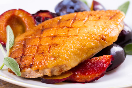 Duck breast with plums and sage, verticalの写真素材