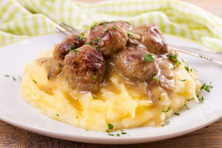 Beef meatballs with mushroom gravy on mashed potatoの写真素材