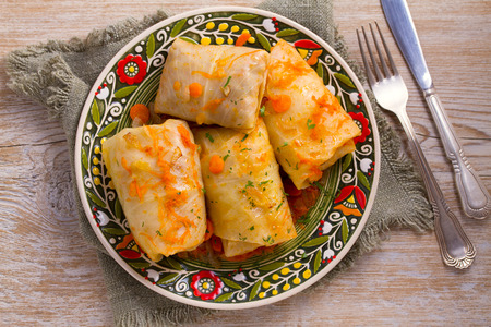 Cabbage rolls with beef, rice and vegetables. Stuffed cabbage leaves with meat. Dolma, sarma, sarmale, golubtsy or golabki. View from above, top, horizontalの写真素材