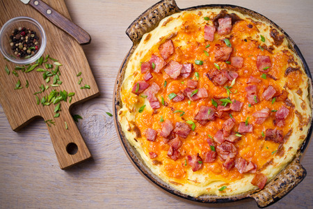 Cheddar Mashed Potato with Bacon Cooked in Oven. Baked Cheddar Potato Casseroleの写真素材