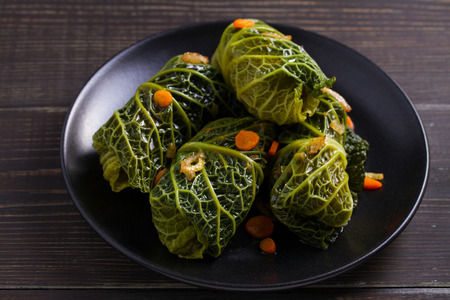 Savoy cabbage rolls with meat, rice and vegetables. Stuffed savoy cabbage leaves with meat. Chou farci, dolma, sarma, sarmale, golubtsy or golabki -popular dish in many countries. horizontalの写真素材