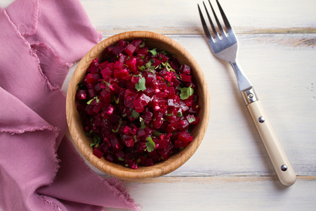 Healthy vegetarian or vegan beetroot, garlic, cilantro and olive oil salad. View from above, top, overhead  の写真素材