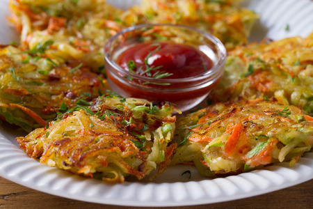 Potato Zucchini and Carrot Pancakes. Vegetable fritters, latkes, draniki. Vegetable cakesの写真素材