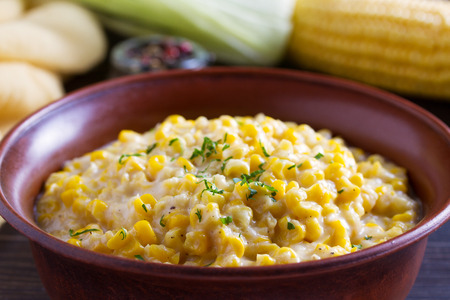 Sweet and creamy skillet corn. Homemade corn dishの写真素材