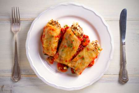 Cabbage rolls with meat, rice and vegetables. Chou farci, dolma, sarma, sarmale, golubtsy or golabki - popular dish in many countries. Overhead, horizontalの写真素材