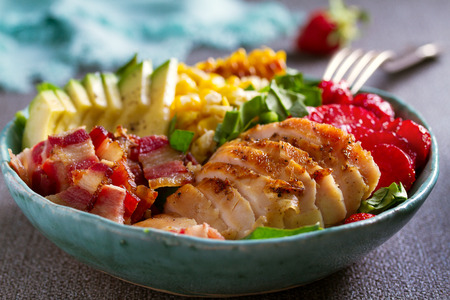 Chicken Cobb Salad. Chicken bacon avocado and sweet corn saladの写真素材