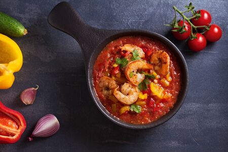 Shrimp Gazpacho with Roasted Red and Yellow Bell Peppers. Spanish soup. View from above, top studio shotの写真素材
