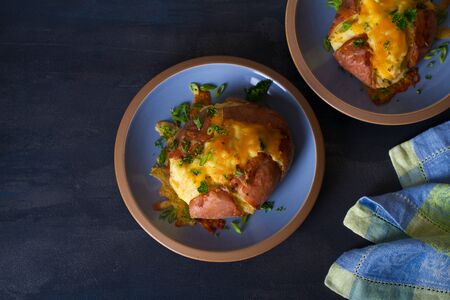 Twice Baked Potatoes with Bacon, Cheese and  Scallion. View from above, top view の写真素材