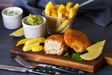 Traditional fish and chips with mushy peas の写真素材
