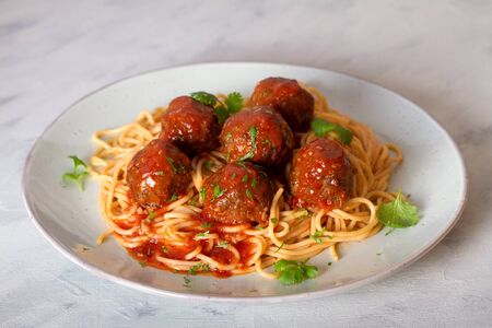 Spaghetti pasta with meatballs and tomato sauce