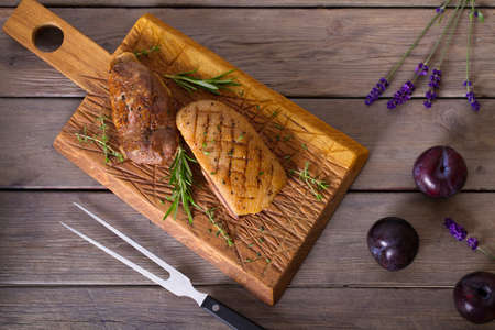 Duck breast fillets with herbs. View from above, top studio shotの写真素材