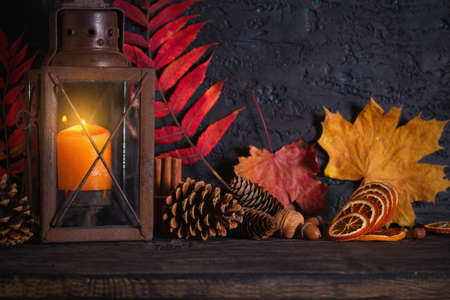 Autumn Thanksgiving Background with lantern and autumn leaves. Winter holidays compositionの写真素材