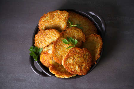 Potato Cakes. Vegetable fritters, latkes, hash browns. Vegetable pancakes. Flat lay, layout, overheadの写真素材