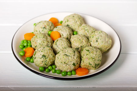 Turkey and spinach meatballs with vegetblesの写真素材