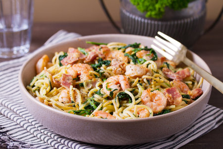 Prawn and bacon pasta with spinach. Spaghettiの写真素材