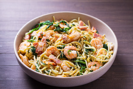 Prawn and bacon pasta with spinach. Spaghettiの写真素材