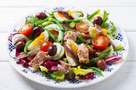 Mediterranean Tuna Salad on white plateの写真素材