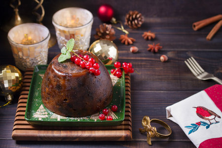 Fruit cake pudding traditionally served as part of Christmas dinner. High angle view with copy spaceの写真素材