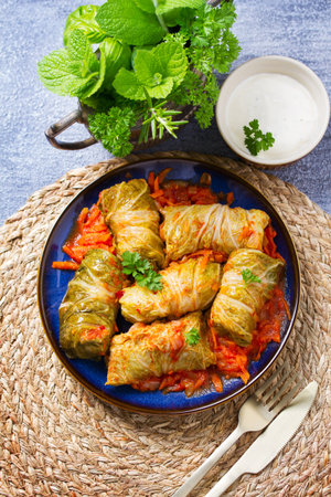 Stuffed cabbage leaves. Cabbage wraps. View from above, top studio shot