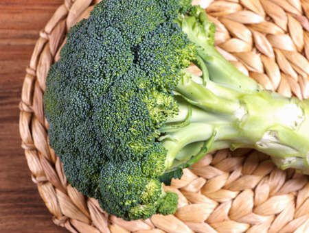 Different types of onion with raw broccoli and cabbage on plate in close-upの写真素材