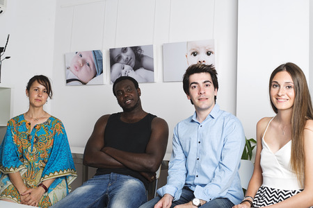 Group of mixed race young people looking at camera.の写真素材
