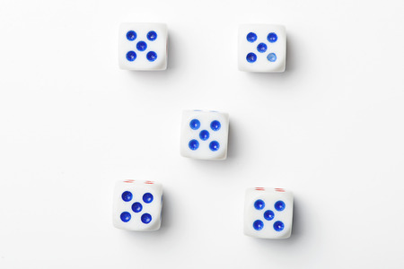 Dice with number five on white background. Isolated.の写真素材