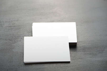 Business card white on black background.