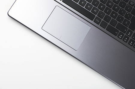 Close-up of keyboard of a laptop computer on white background.の写真素材
