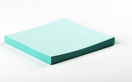 Stack of blue paper notes. Isolated.