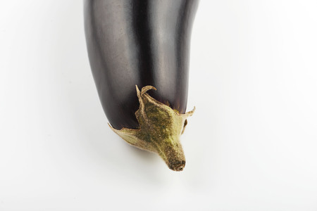 Close-up of two aubergines on white background. Isolated.の写真素材