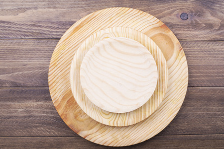 Background wooden plates on wooden background. Copy space.の写真素材