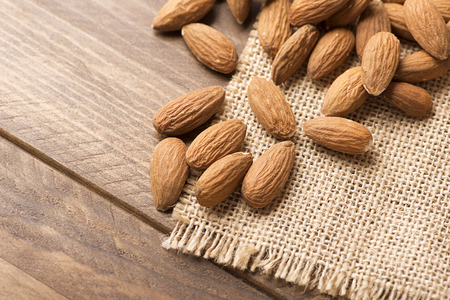Close-up of almonds on fabric. Horizontal shoot.の写真素材