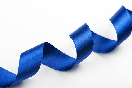 Abstract blue ribbon background on white background. Copy space. の写真素材