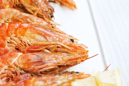 Close-up of shrimps served with lemon. Copy space. Marisco.の写真素材