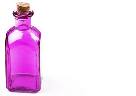 Glass jar of lilac color on white background. Isolated. Container. Copy space.の写真素材
