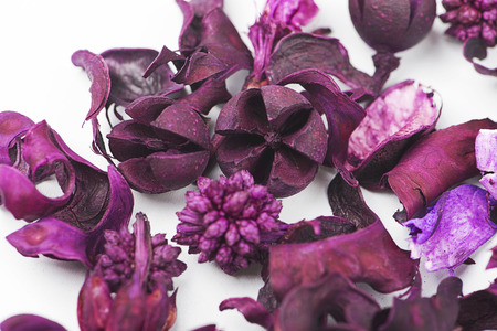 Close-up of dry mix for aromatic effect spilled on white background.の写真素材