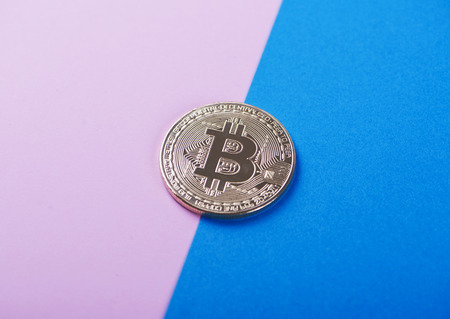 Bitcoin on pink and blue background. Cryptocurrencyの写真素材