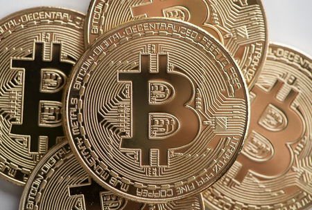 Several Bitcoin coins on white background. Cryptocurrencyの写真素材