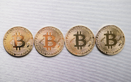 Several Bitcoin coins on gray background. Cryptocurrencyの写真素材