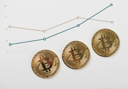 Bitcoin currencies on business graphs. Cryptocurrencyの写真素材