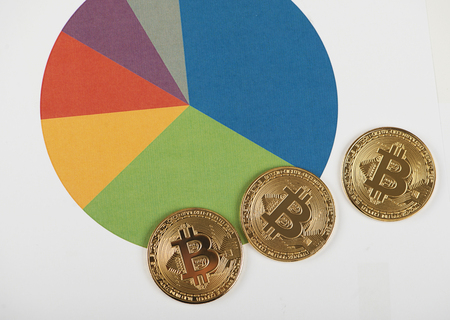 Bitcoin currencies on business graphs. Cryptocurrencyの写真素材