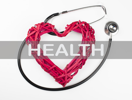 Concept background about Health, with the word written on a heart and stethoscope. Conceptの写真素材
