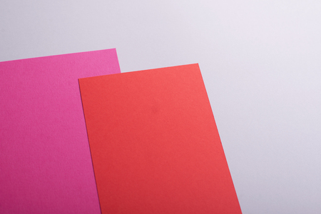 Cardboards of various colors on gray background. Mockup.の写真素材