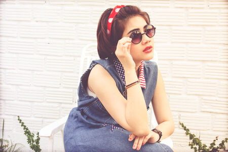 young pretty women in vintage retro clothe theme style