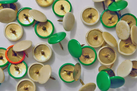 drawing pins used to attach notes on the wallの写真素材