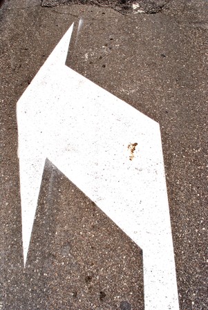printed on the asphalt road signs to indicate with an arrow to turn left